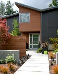 A sense of arrival is elongated and accentuated with a slight jog in the entry pathway.  Containers are from Ragen & Associates.
